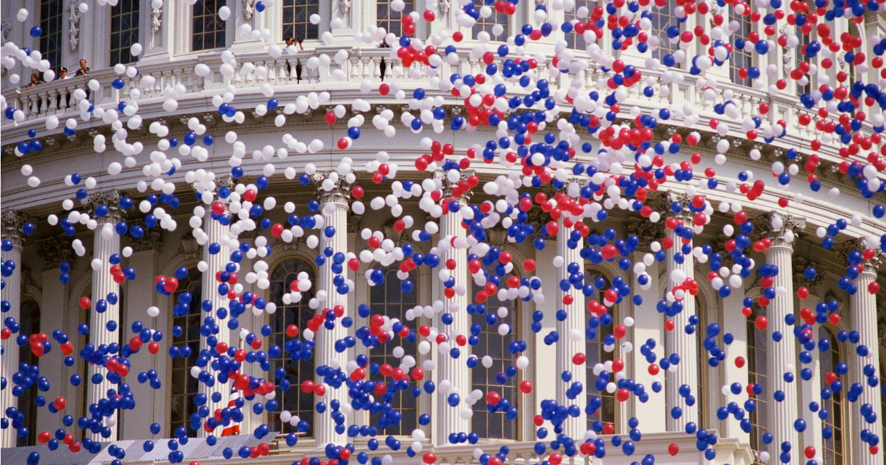 Balloons falling in front of the Capitol building