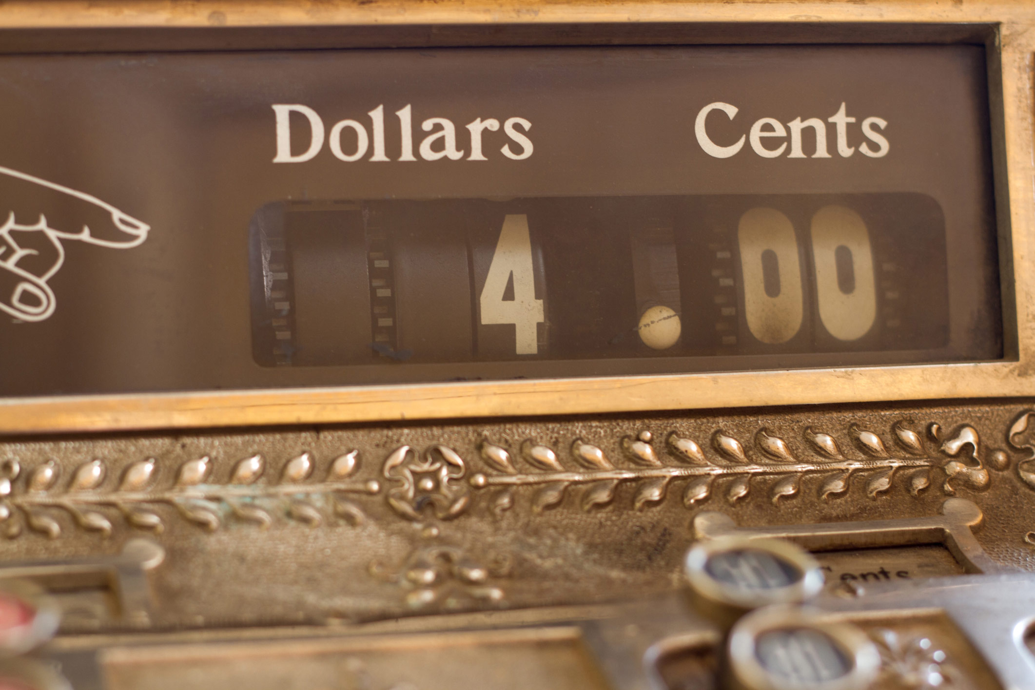 An image of a cash register showing $4.00