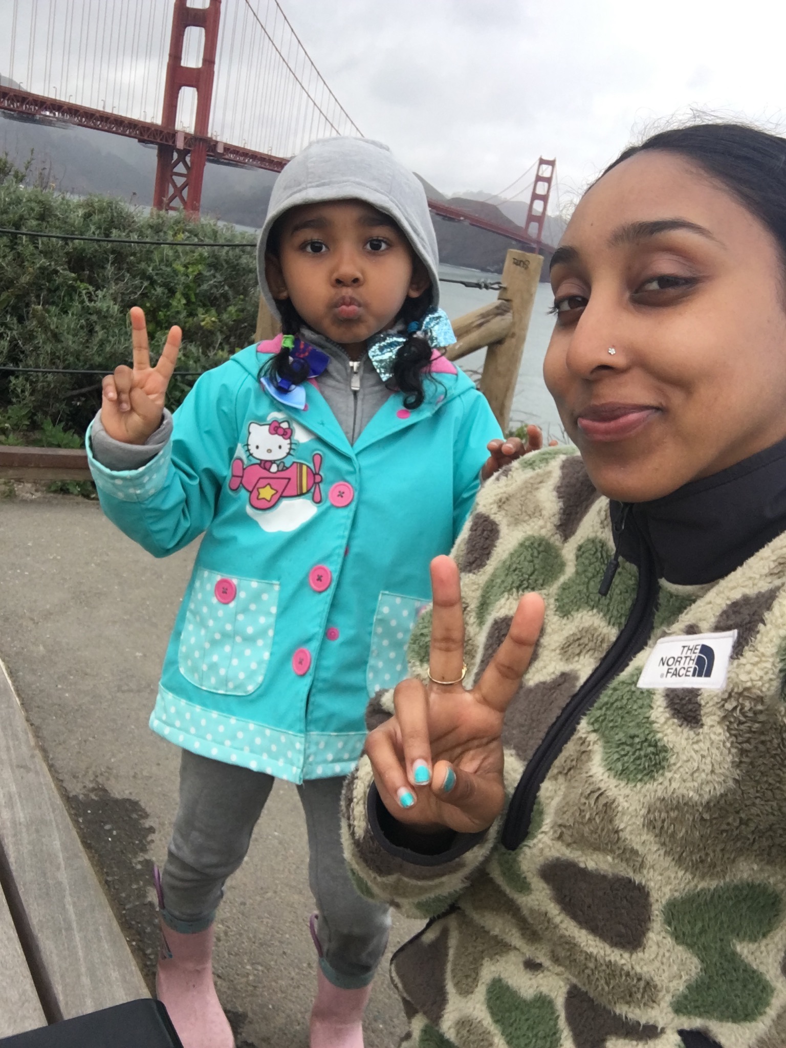 A photo of Maile and her daughter by the Golden Gate Bridge.