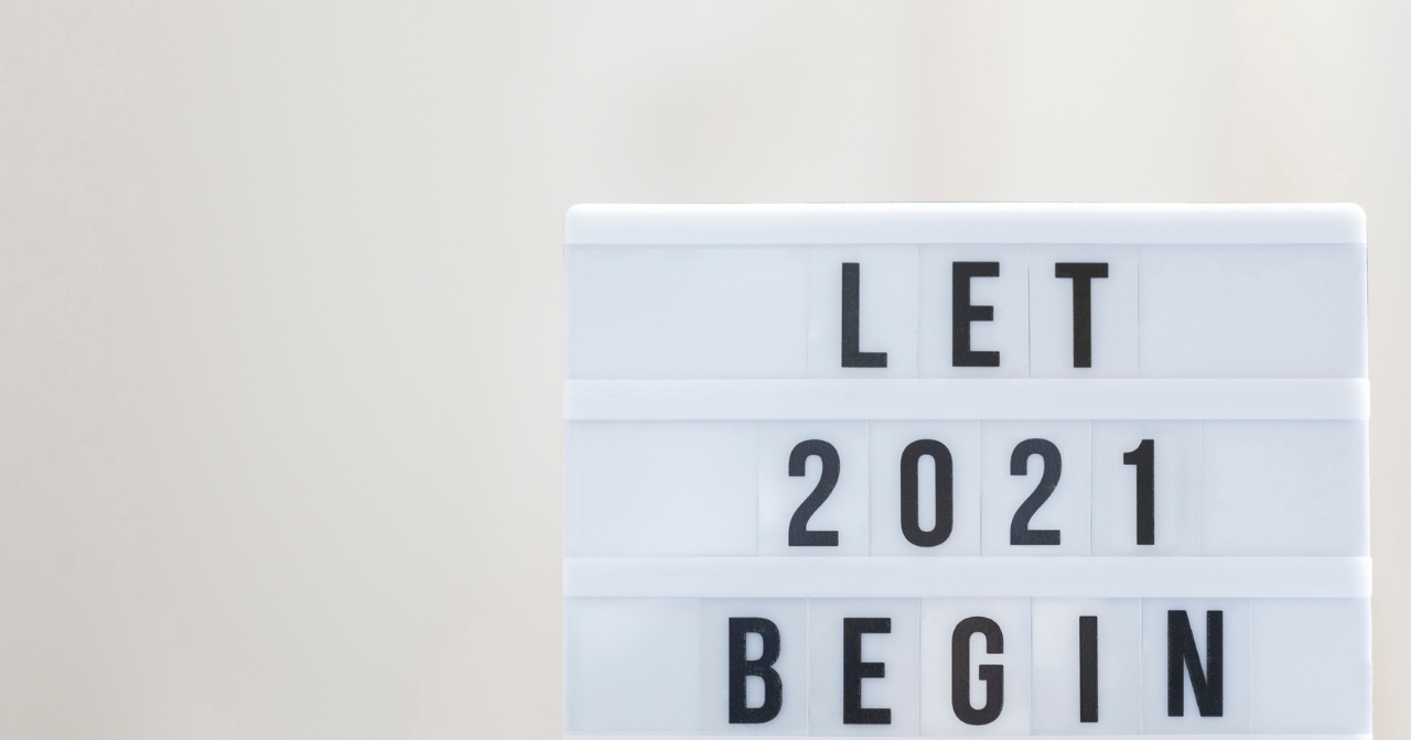 A lightboard with the words, "Let 2021 Begin"