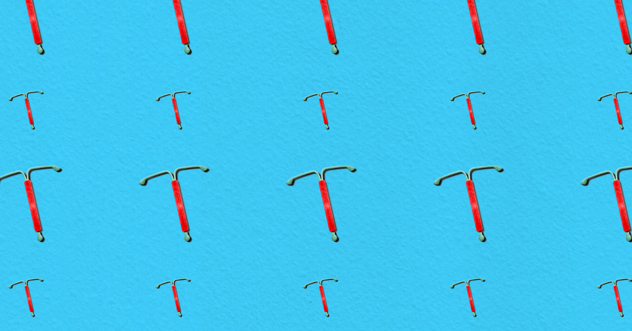 A repeating background of red IUDs against a solid blue. 