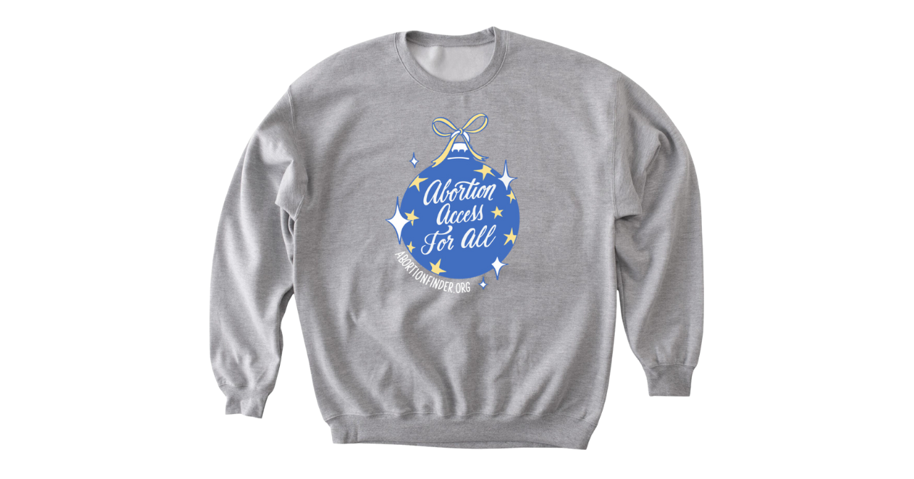 A photo of a sweatshirt with a design of a christmas ornament that read, "Abortion Access for all."