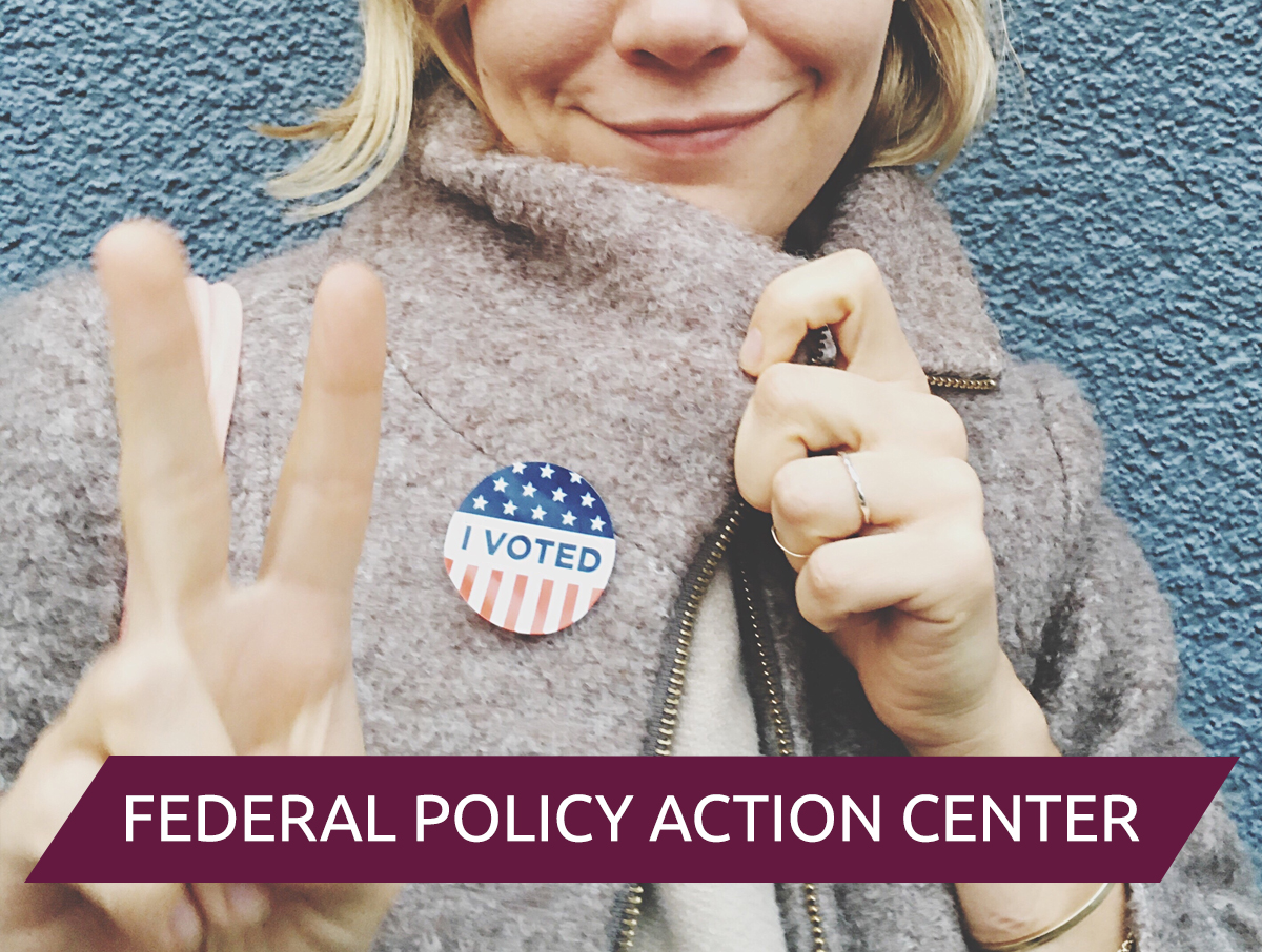 A woman with an I Voted sticker holding out the peace sign and the words, "Federal Policy Action Center"