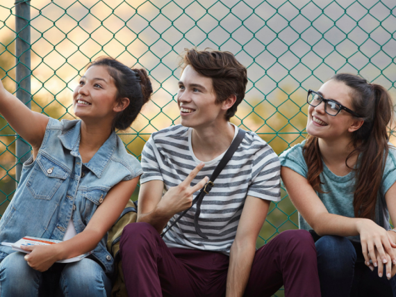 Four teen friends take a selfie