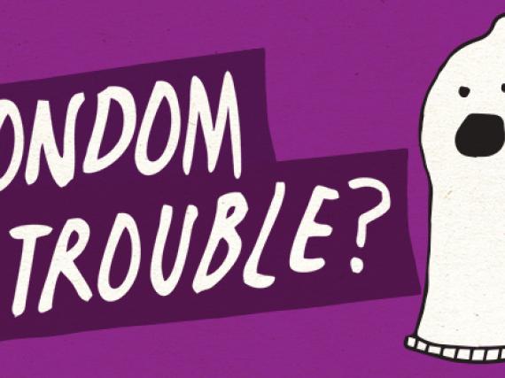 A condom saying, "Condom Trouble."